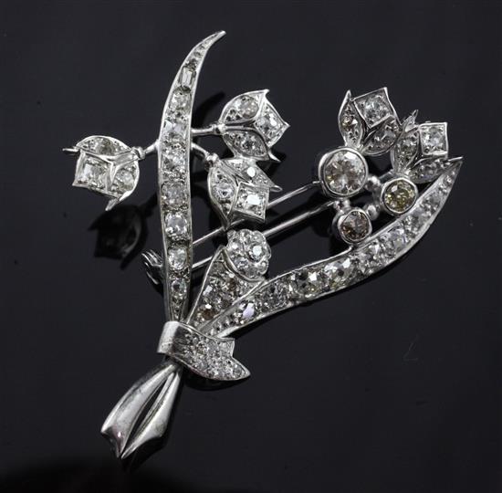 A white gold and diamond floral spray brooch, 2in.